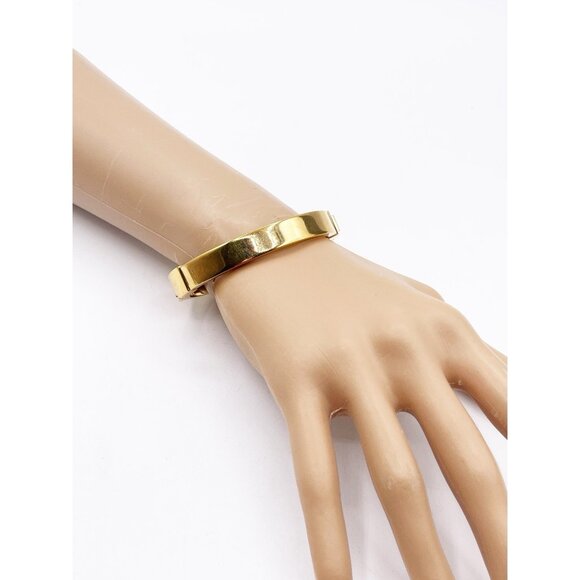 Michael Kors Gold Tone Hinged Bangle Bracelet Polished Logo Clasp MK Designer - Picture 1 of 7